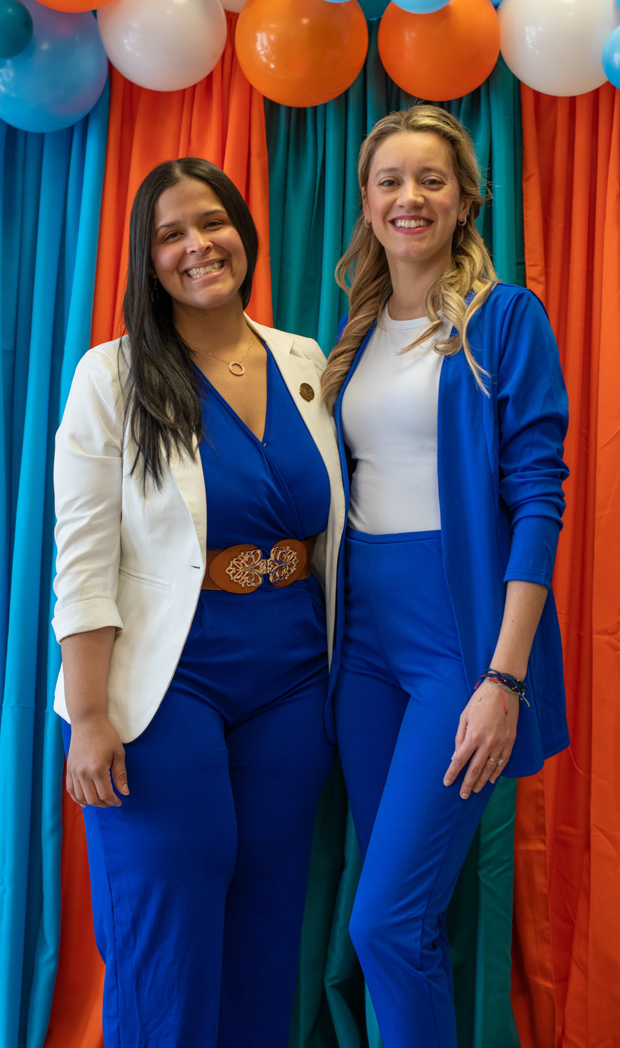 Lucy Nunnery and Juliana Baca Roman, owners of Viva Hydration, pose at the grand opening of the business last Saturday.
